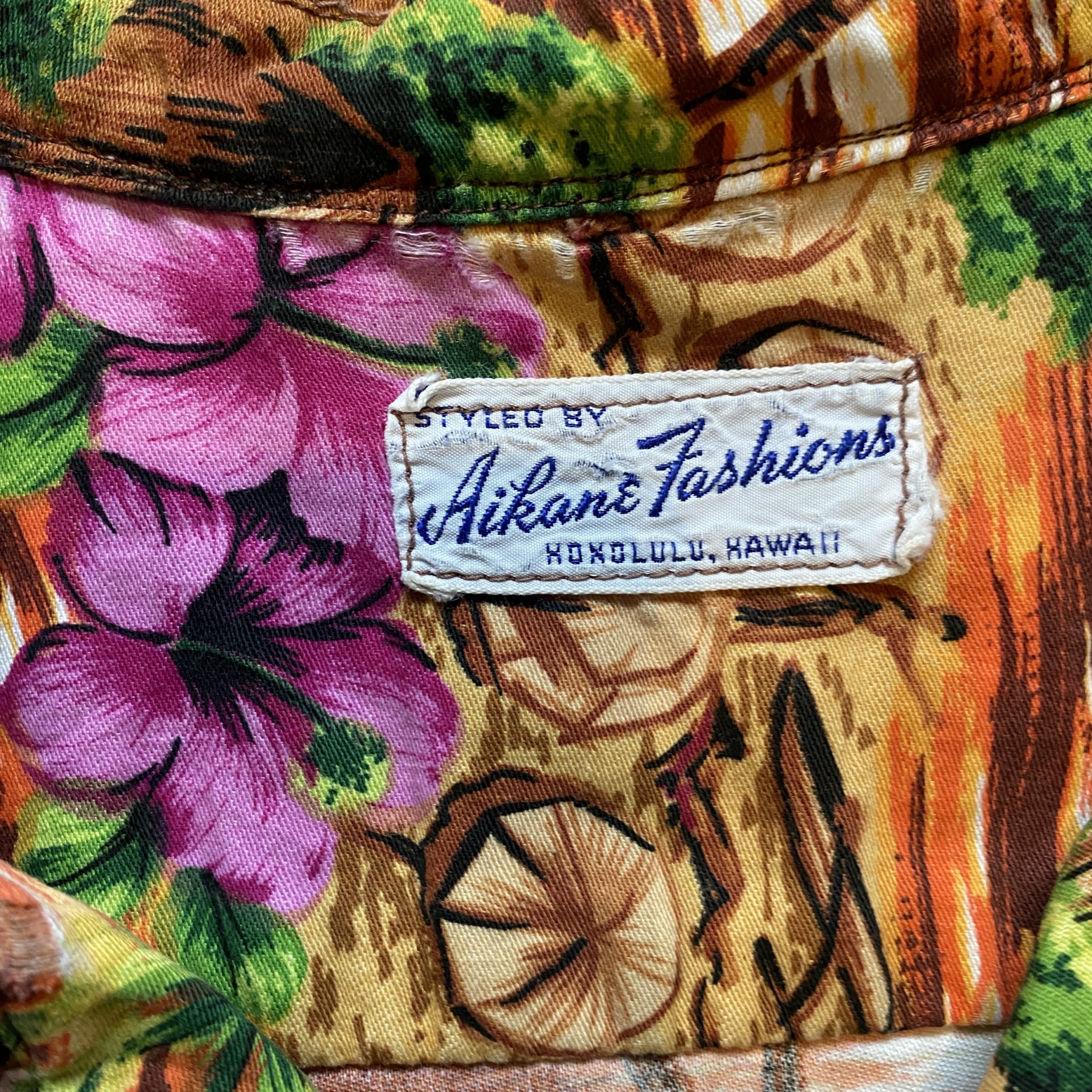 1960’s USA製ビンテージ Aikane fashions アイランド柄 総柄 古銭ボタン アロハシャツ